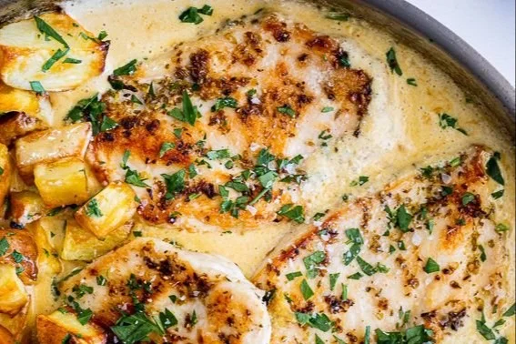 Creamy Dijon Chicken served with potatoes in Dijon sauce