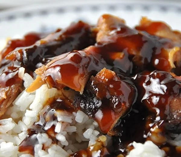 Bowl of delicious Crock Pot Bourbon Chicken ready to serve