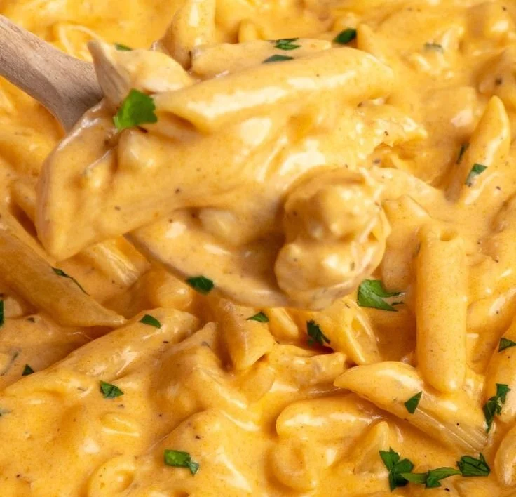 Crock Pot Buffalo Chicken Pasta in a creamy sauce with toppings