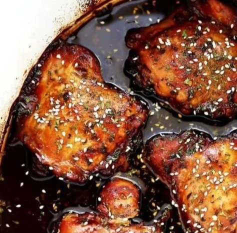 Delicious Crock Pot Honey Garlic Chicken served on a plate with vegetables.