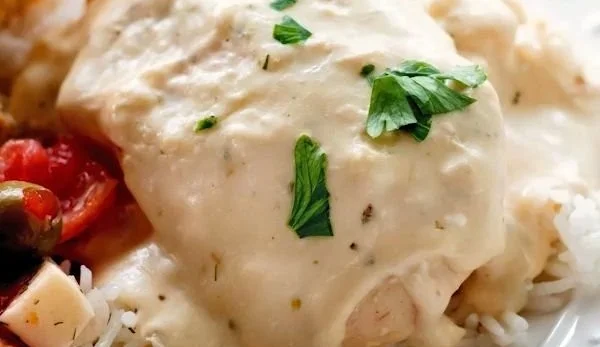 Crock Pot Ranch Cream Cheese Chicken served with fresh herbs
