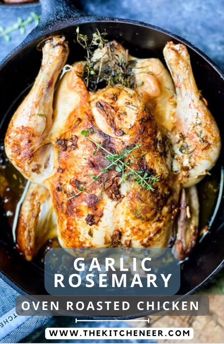Garlic rosemary oven roasted chicken served with herbs and sides