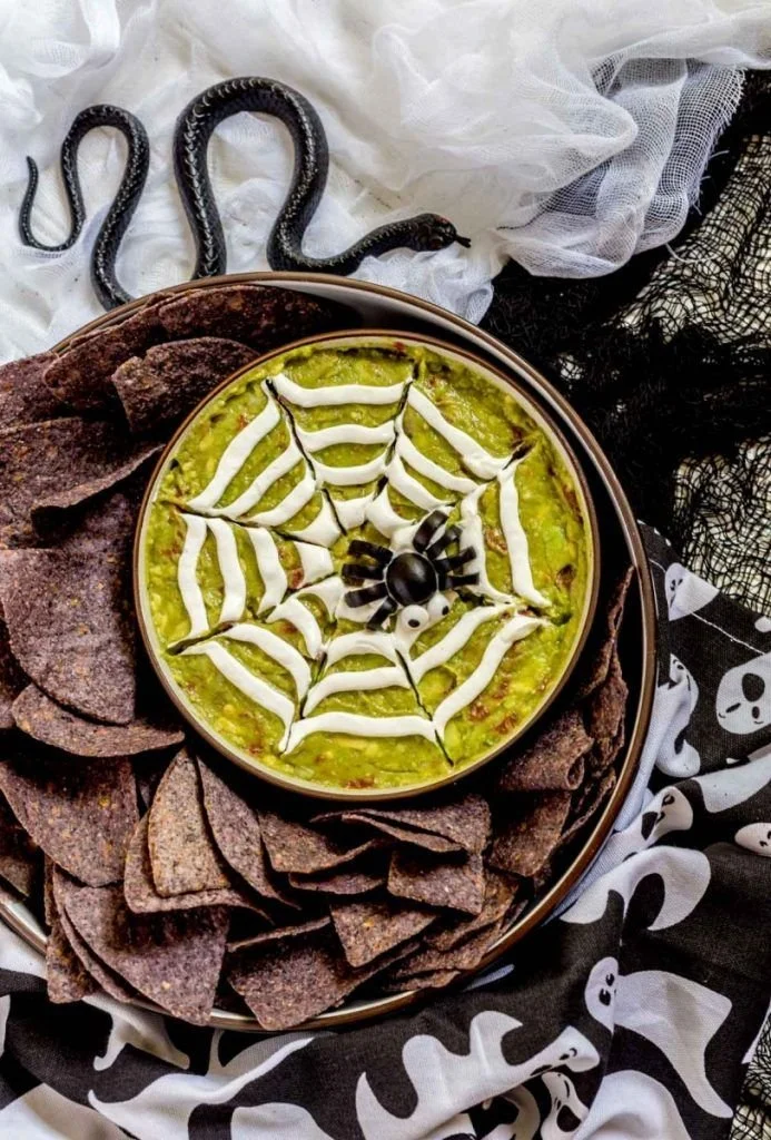 Delicious guacamole Halloween appetizers served in creative spooky designs