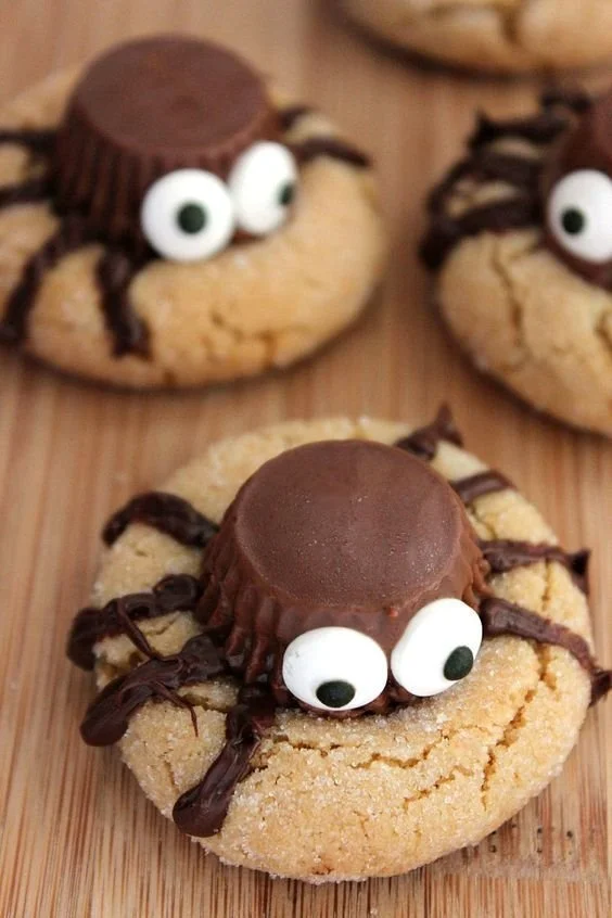 Delicious Halloween peanut butter spider cookies on a plate.