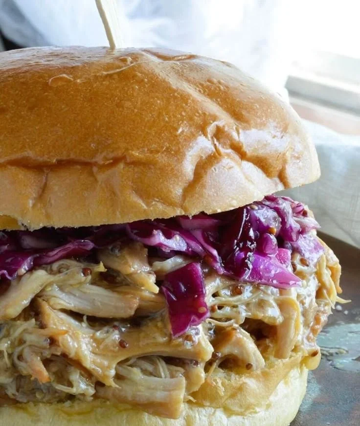 Delicious honey mustard shredded chicken sandwich made in a crockpot