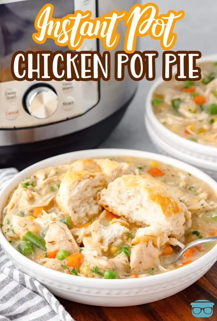 Delicious Instant Pot chicken pot pie served in a bowl with herbs and vegetables