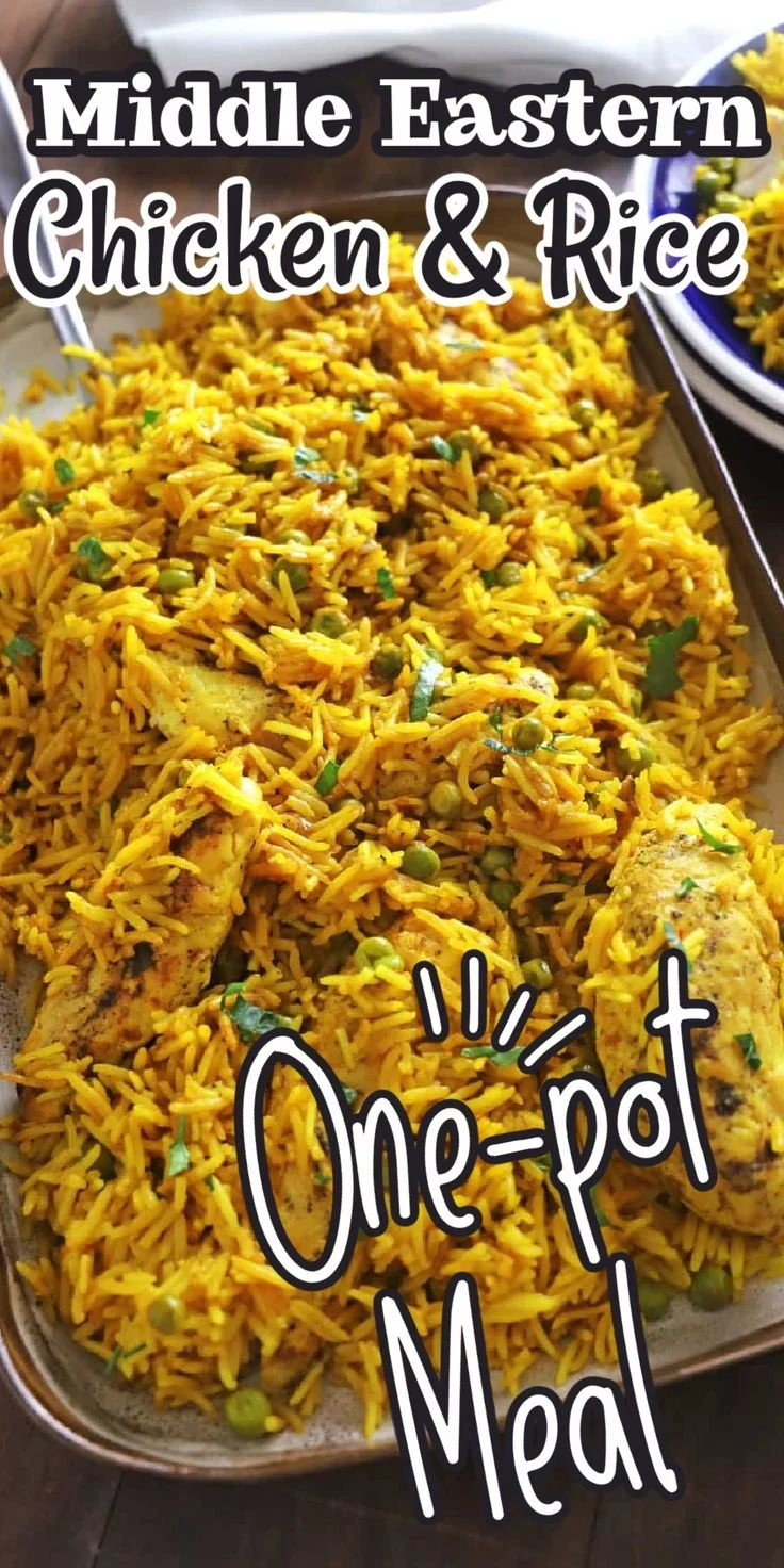 Plate of Middle Eastern chicken and rice garnished with herbs and spices