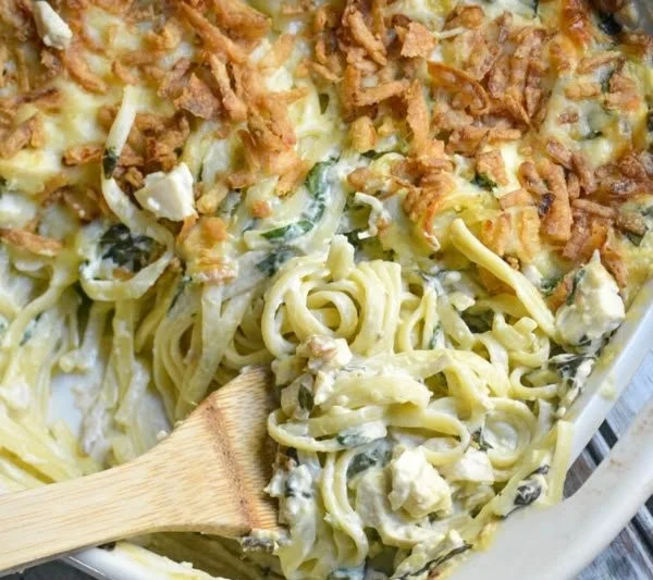 Monterey Chicken Spaghetti Casserole baked dish served with a sprinkle of herbs