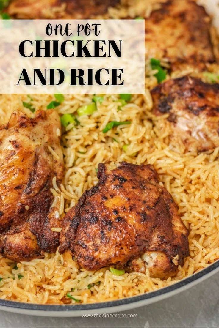 One-pot chicken and rice dish garnished with herbs and colorful vegetables