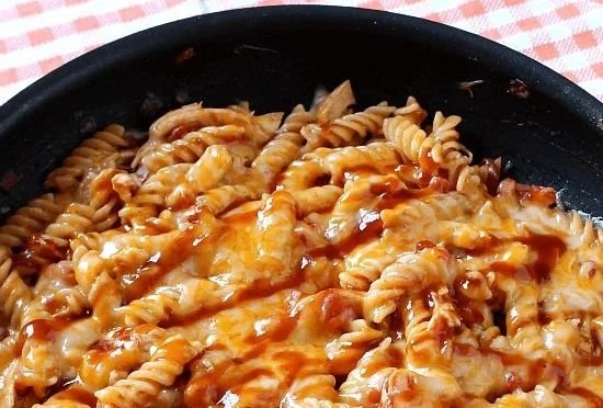 Delicious One Skillet BBQ Cheesy Chicken Pasta served in a bowl