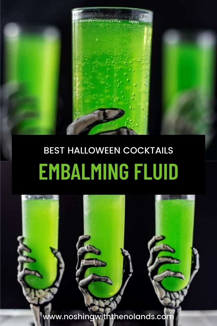 A vibrant Embalming Fluid Cocktail served in a stylish glass with garnish.